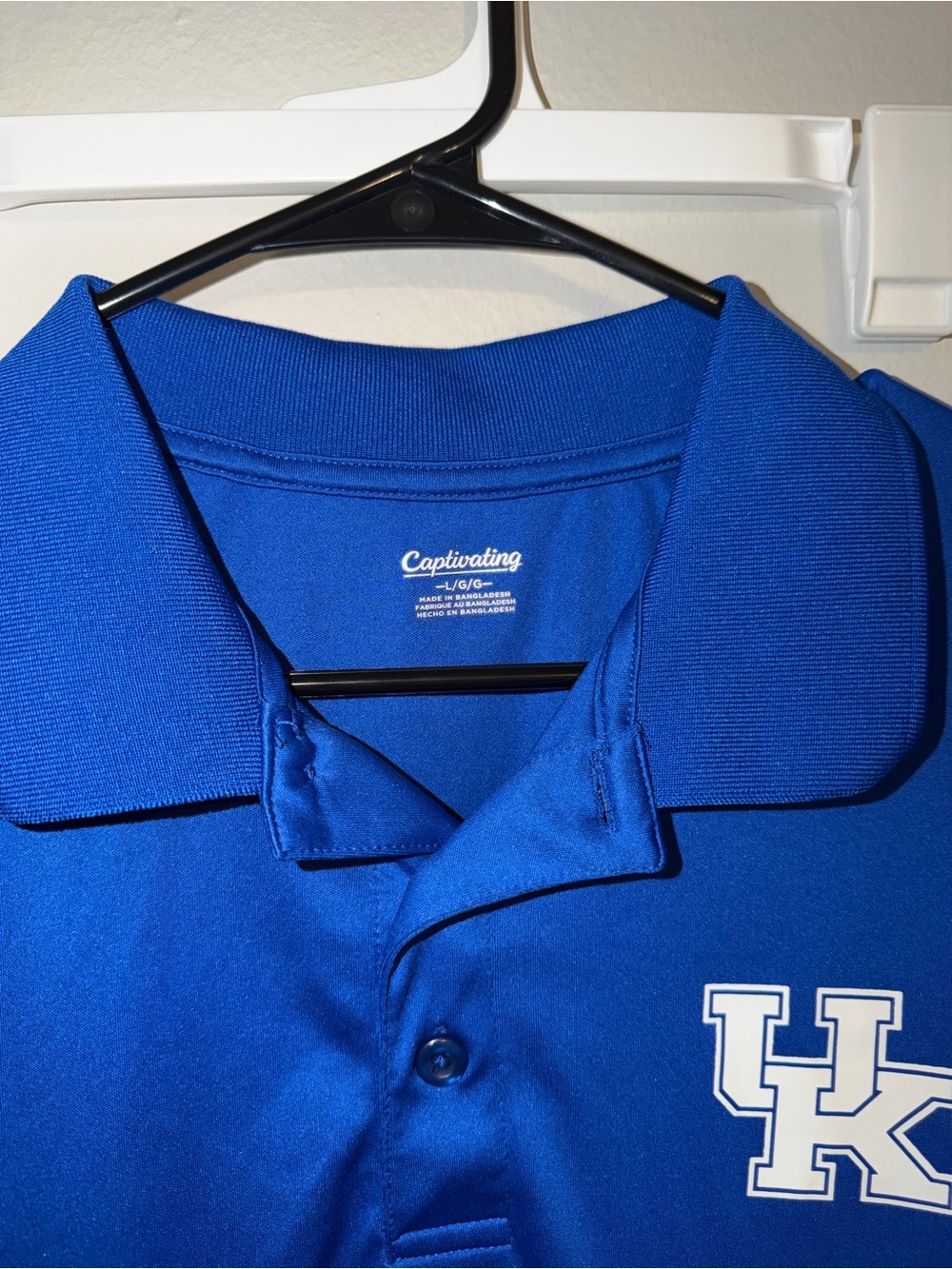 Captivating Men's Blue Polo with UK Logo